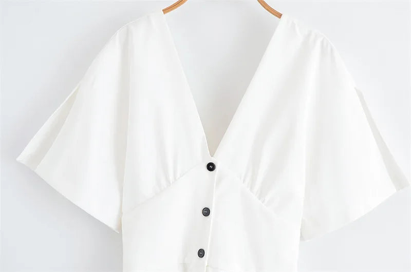 Valerie | Witte midi jurk met knoopsluiting en cape mouwen