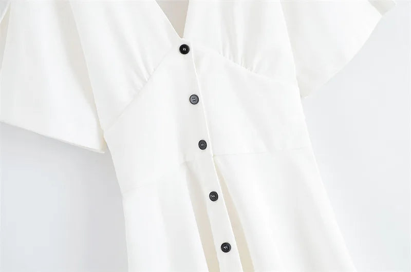 Valerie | Witte midi jurk met knoopsluiting en cape mouwen