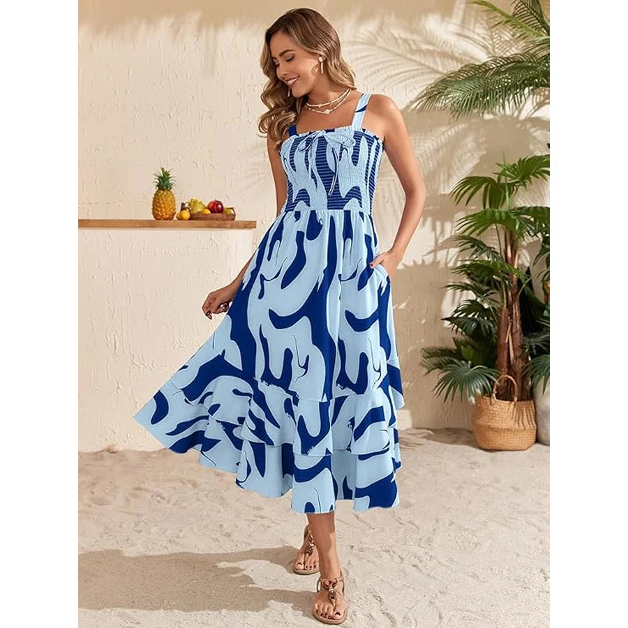 Maja | Midi jurk met abstracte print en strikdetail
