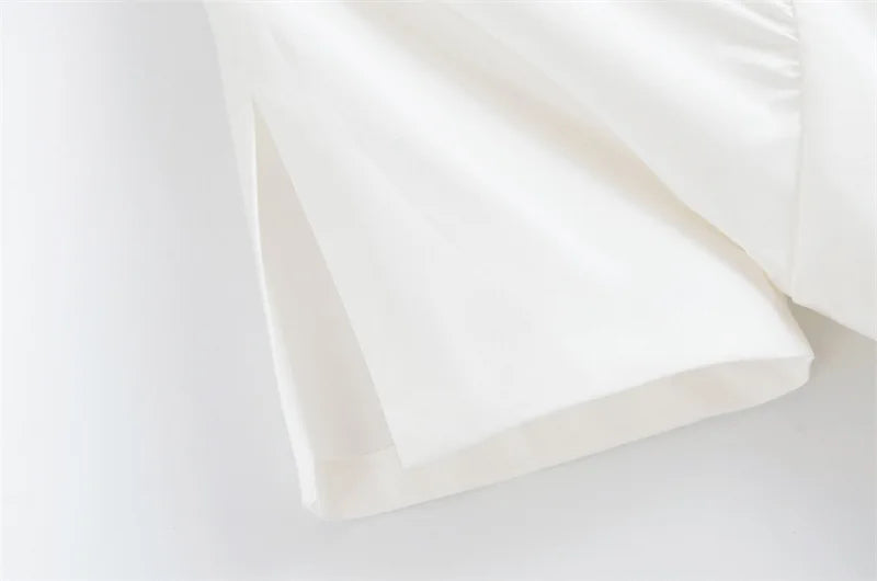 Valerie | Witte midi jurk met knoopsluiting en cape mouwen